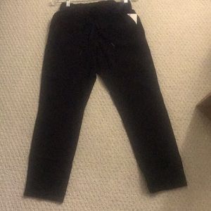 Lululemon On the Fly 7/8 Pant.  Black size 4.